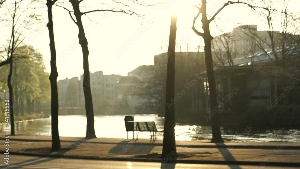 Quiet sunset at Amsterdam Netherland park and seating next to canal
