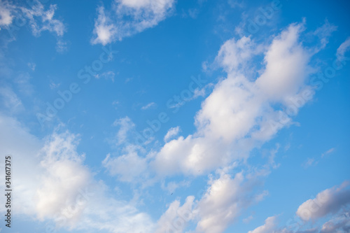 clear blue sky with plain white cloud with space for text background