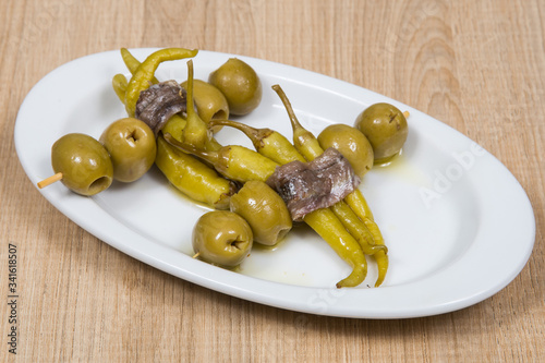 Traditional appetizer from Basque Country, Spain, named. Tasty, chili.