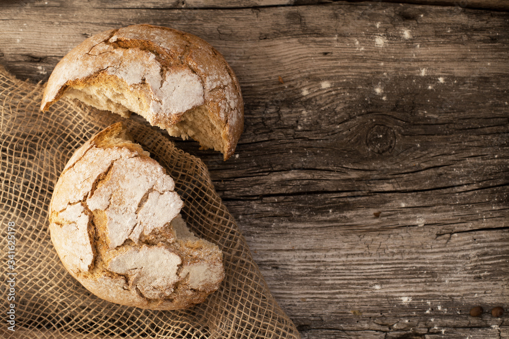 homemade fresh bread on a wooden table