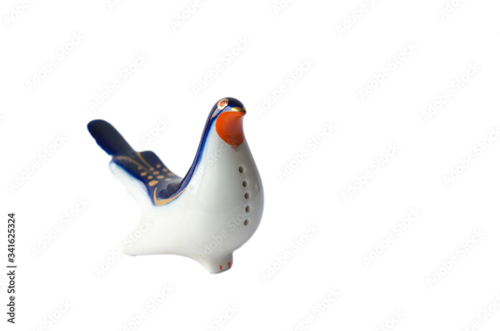 Naklejka Porcelain figurine of a bird on a white background