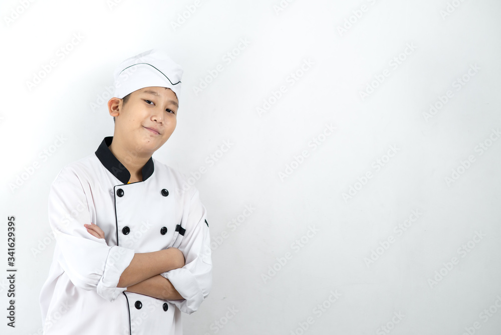 Japanese food chef in uniform crossing arms on wall.