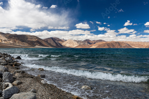 High altitude Pangong lake in Ladakh on sunny day. Beautiful north India landscape.