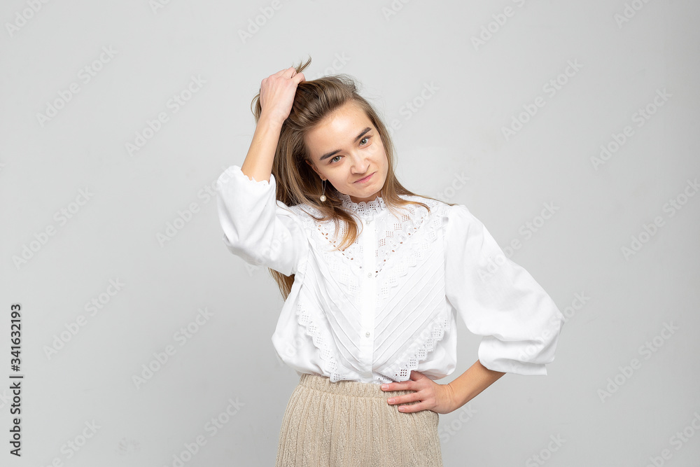 Very angry woman. Frustration. Frustrated and stressed young businesswoman. Beautiful young mixed race asian / caucasian woman isolated on white background. Very angry woman. Frustration. Frustrated and stressed young businesswoman. Beautiful young mixed race asian / caucasian woman isolated on white background.