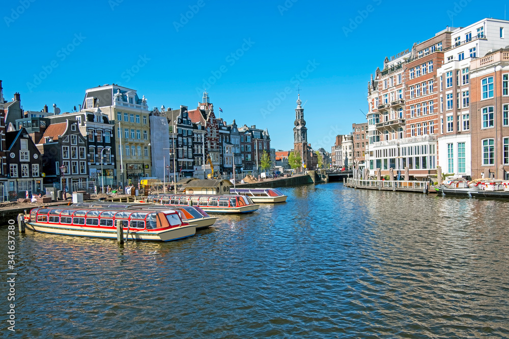 City scenic from Amsterdam with the Munt tower in the Netherlands