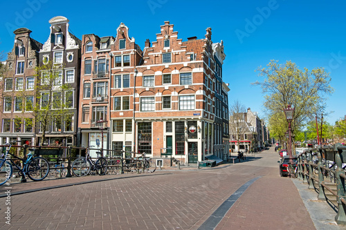 Medieval facades along the canal in the Jordaan in Amsterdam the Netherlands photo