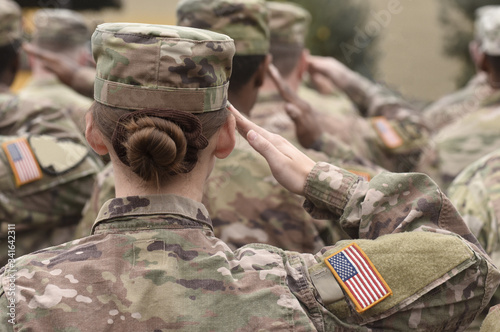 Memorial day. Veterans Day.  American Soldiers Saluting. US Army. Military of USA . photo
