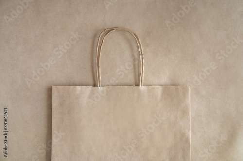 Paper bag for takeaway on paper texture background