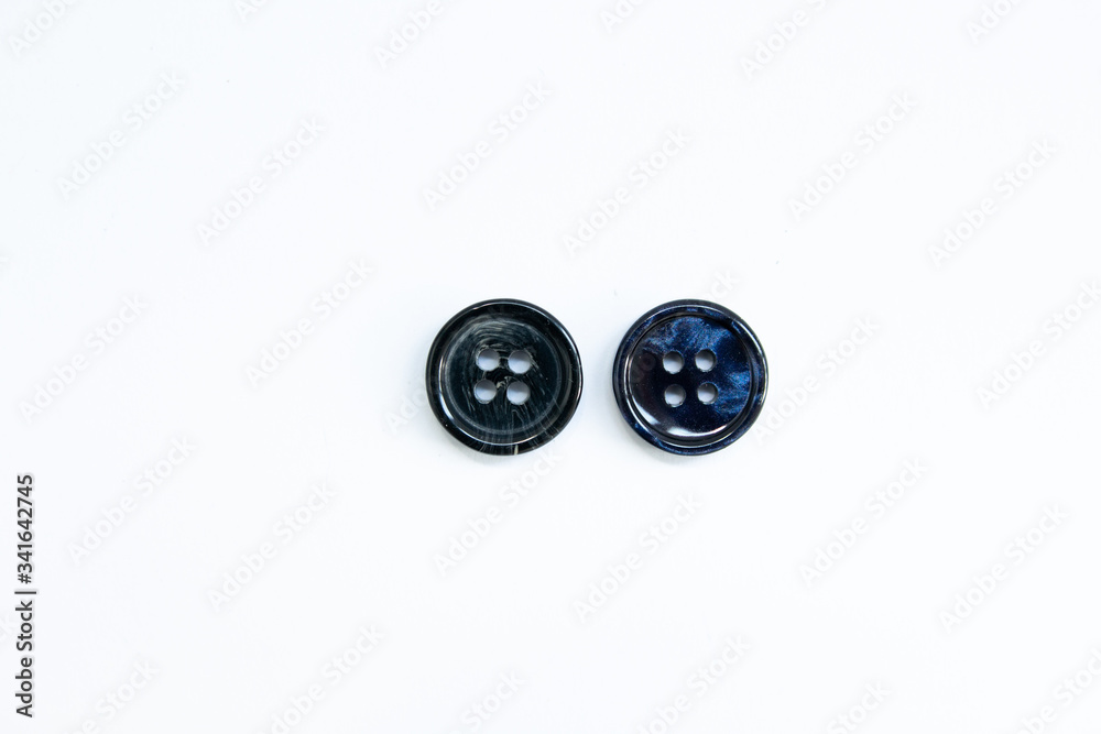 black buttons on a white background black buttons on a white background