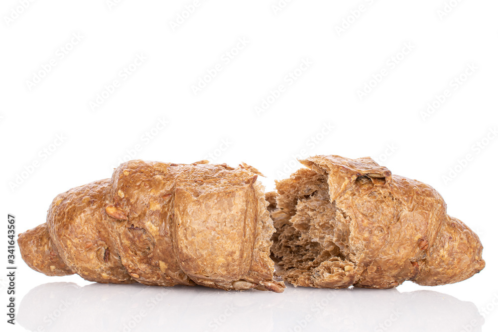 Group of two halves of baked wholegrain croissant isolated on white Group of two halves of baked wholegrain croissant isolated on white