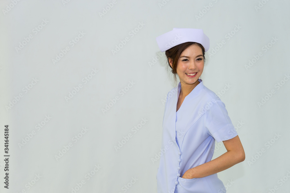 Portrait of an Asian nurse with white background. Portrait of an Asian nurse with white background.