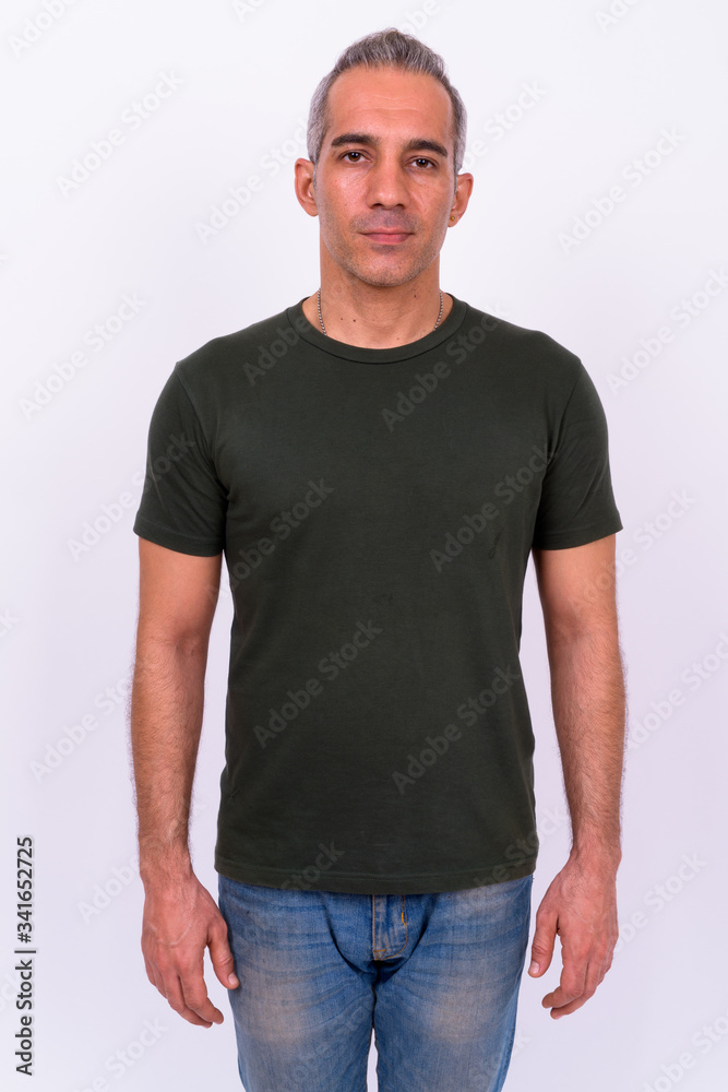 Fototapeta premium Portrait of handsome Persian man looking at camera