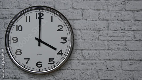 Wallpaper Mural The Time On The Clock Four. Clock With The Black Arrows With The Arabic Numerals On An White Brick Wall Background On The Left Side. Torontodigital.ca