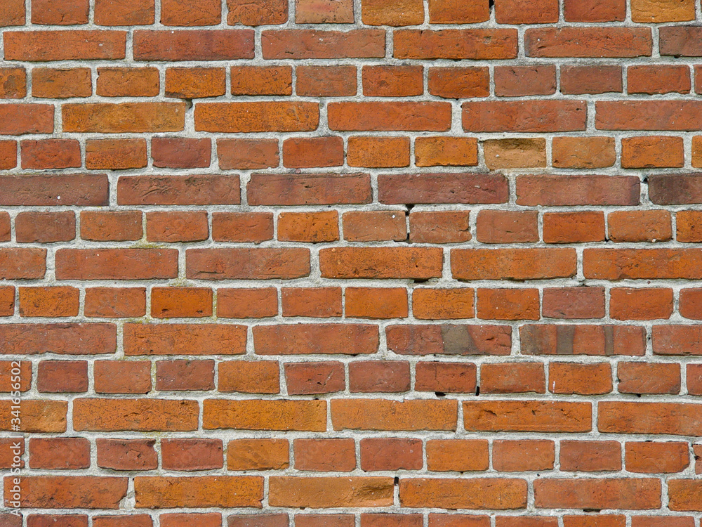 Brick wall of red brick in an old house. Brick wall of red brick in an old house.
