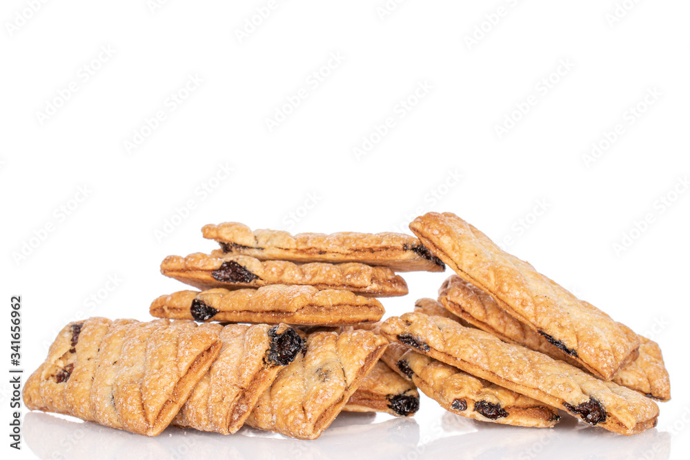 Lot of whole square puff cookie with raisins heap isolated on white Lot of whole square puff cookie with raisins heap isolated on white