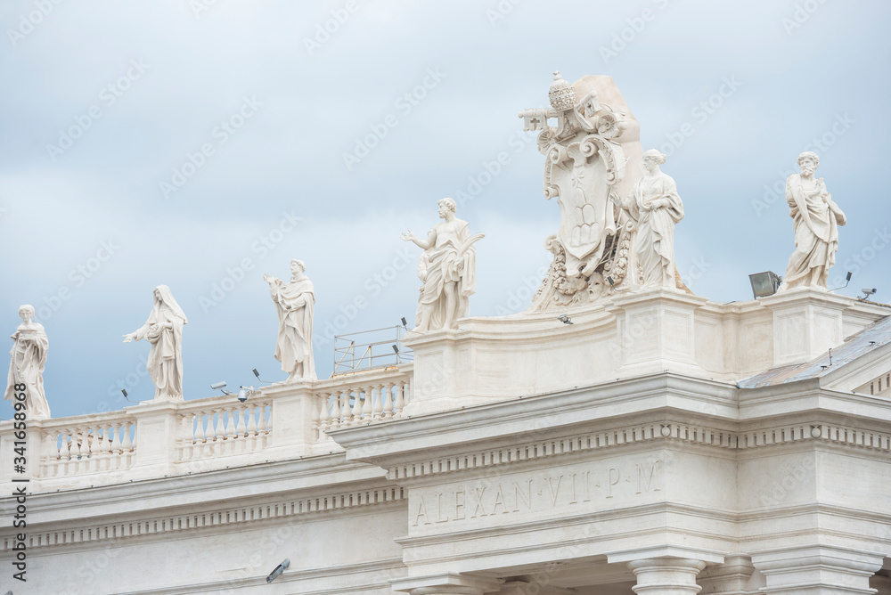 Vatican, Rome / Italy 10.02.2015.Statues on the roofs of the Papal Basilica of Saint Peter in the Vatican
