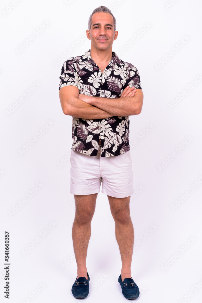 Fototapeta premium Handsome Persian tourist man against white background
