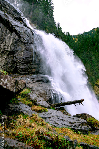 Waterfall in mountains.