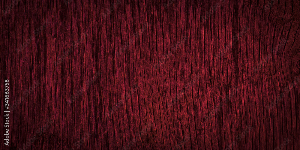 Dark burgundy wood texture. Texture of old dried plywood. Mahogany background for design. Dark burgundy wood texture. Texture of old dried plywood. Mahogany background for design.