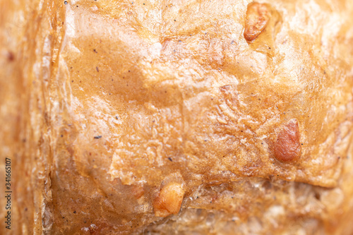 Baked wholegrain croissant isolated macro