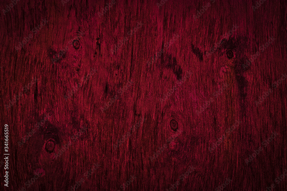 Dark burgundy wood texture. Texture of old dried plywood. Mahogany background for design. Dark burgundy wood texture. Texture of old dried plywood. Mahogany background for design.