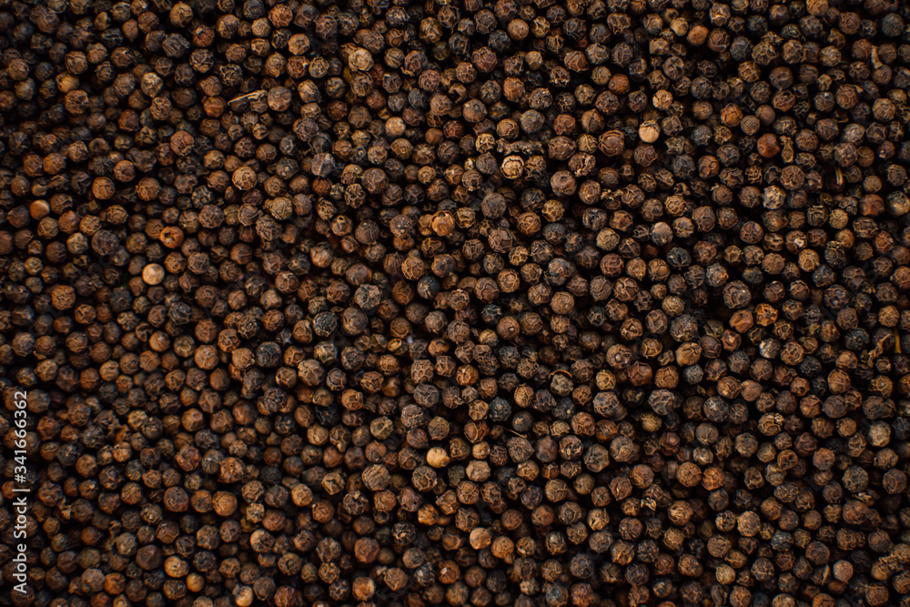 Close up of black pepper texture or background. Close up of black pepper texture or background.