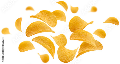 Potato chips levitate on a white background