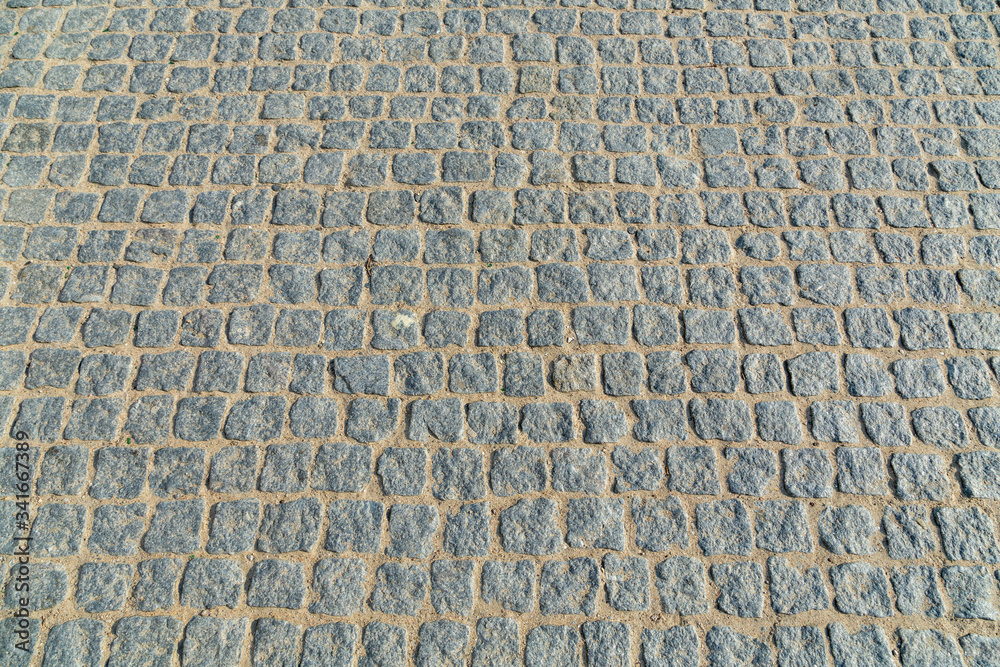 pattern of old paved cobblestone street pattern of old paved cobblestone street