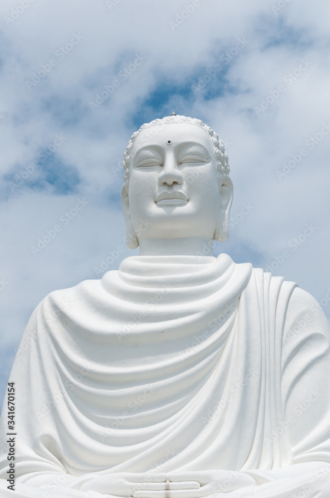 Nha Trang, Vietnam - March 20, 2019: Statue of the Big Buddha in Long Son Pagoda, Vietnam