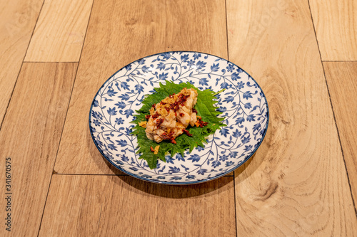 chicken shisho on wooden background photo