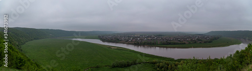 panorama view of the Dniester River in cloudy weather in early spring