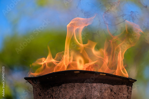 memorial fire in a soldiers helmet