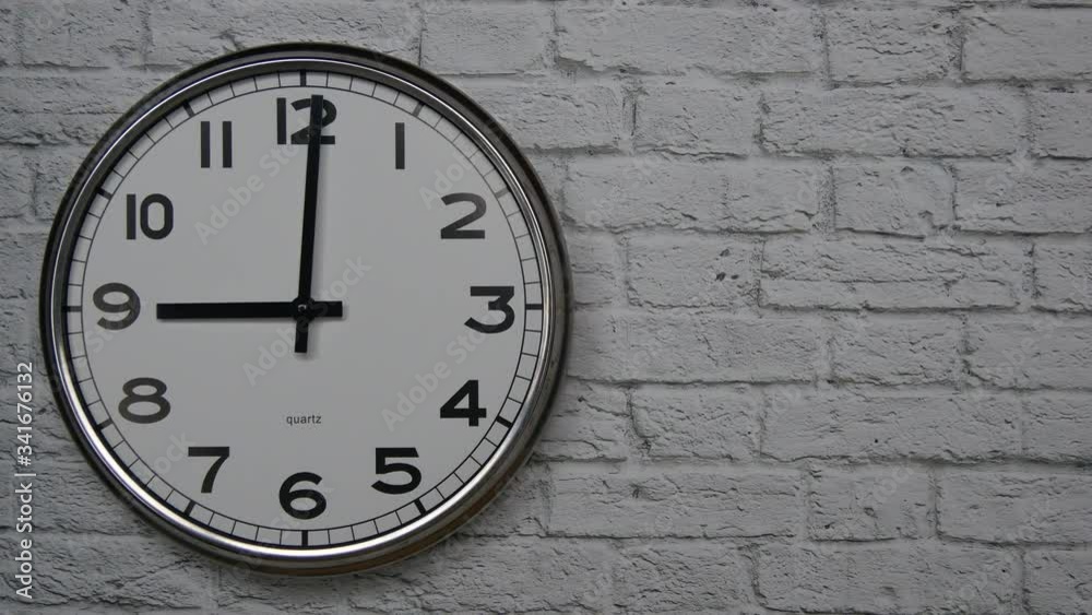 custom made wallpaper toronto digitalThe Time On The Clock Nine. Clock With The Black Arrows With The Arabic Numerals On An White Brick Wall Background On The Left Side.