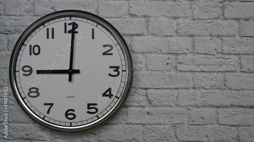 Wallpaper Mural The Time On The Clock Nine. Clock With The Black Arrows With The Arabic Numerals On An White Brick Wall Background On The Left Side. Torontodigital.ca