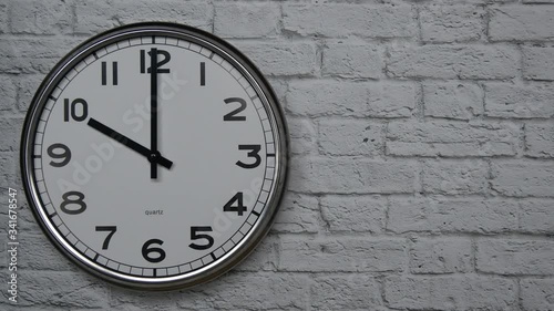 Wallpaper Mural The Time On The Clock Ten. Clock With The Black Arrows With The Arabic Numerals On An White Brick Wall Background On The Left Side. Torontodigital.ca