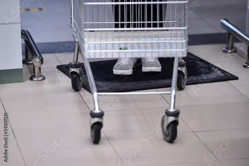 People are shopping in a supermarket couple of days before the orthodox Easter, during the coronavirus pandemic.