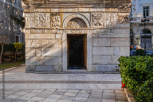 Byzantine style Church of Panagia Gorgoepikoos or Agios Eleftherios (Our Lady Who Grants Wishes Fast, XII century) in the heart of Athens at 8 Mitropoleos Square. Athens, Greece. photo