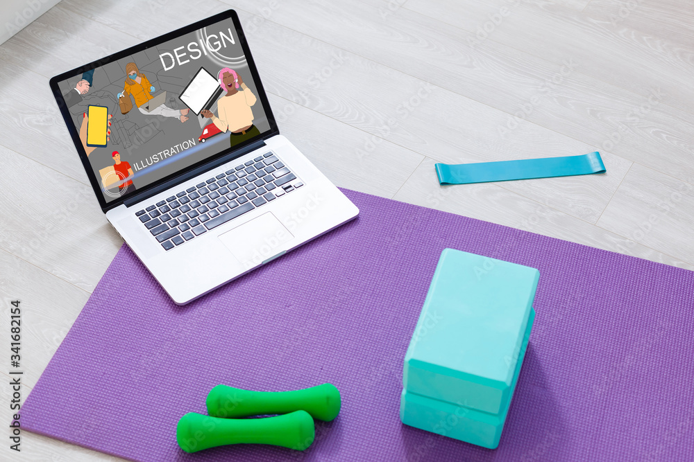 Workplace with laptop on table at home web designer or artist. Concept of a freelance and creative work online Workplace with laptop on table at home web designer or artist. Concept of a freelance and creative work online