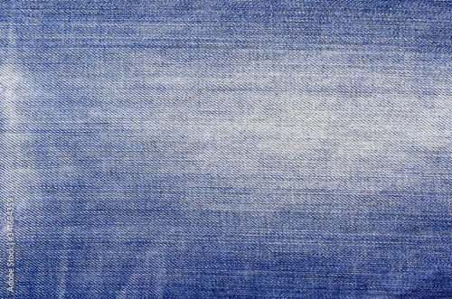 Retro color tone of blue denim jeans fabric texture for background website fashion design or backdrop product. 