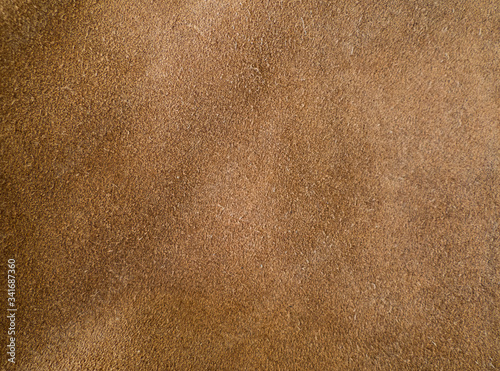Cognac brown suede leather background texture