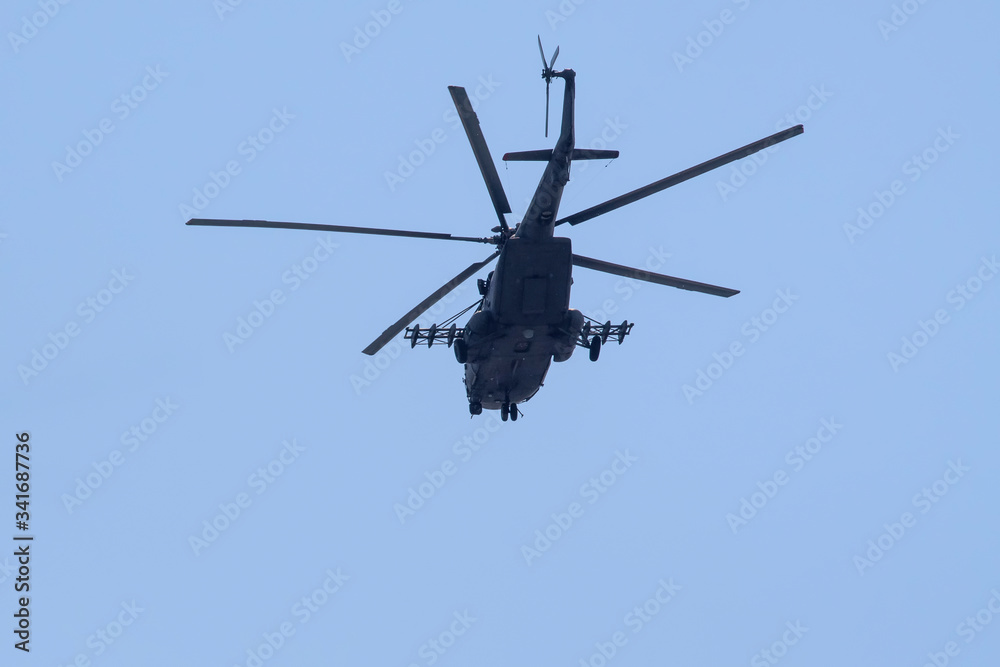 Russian military helicopters against the blue sky. Russian military helicopters against the blue sky.