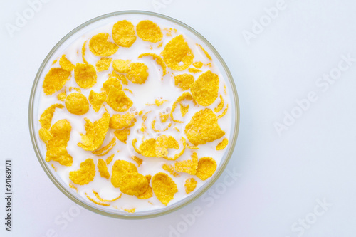 Cornflakes in a bowl. Top view, on a white background. place for copy space