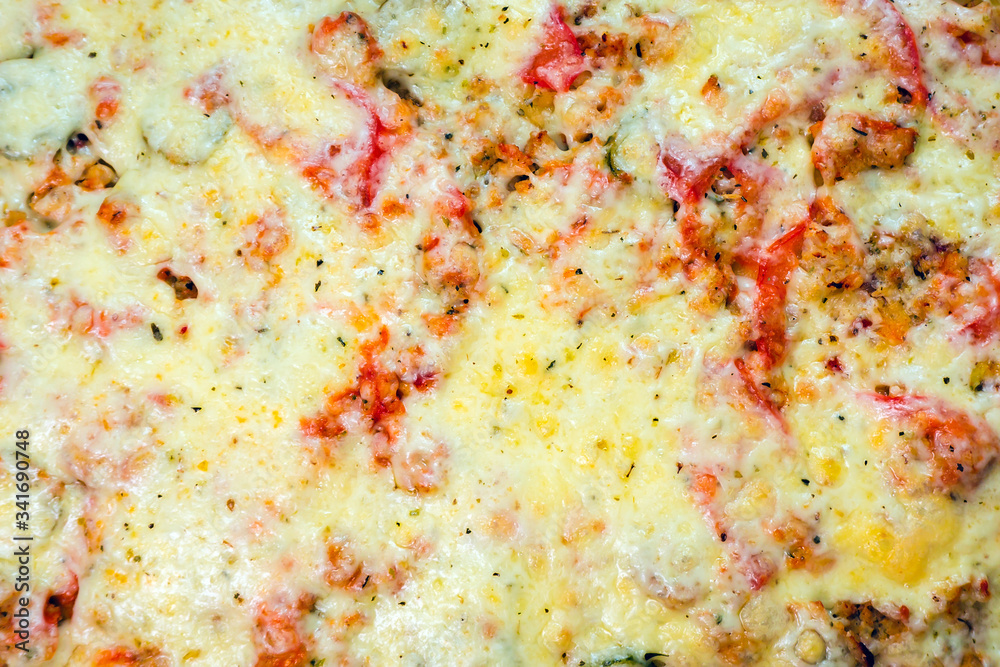 background of hot pizza with cheese top view, texture. homemade food background of hot pizza with cheese top view, texture. homemade food
