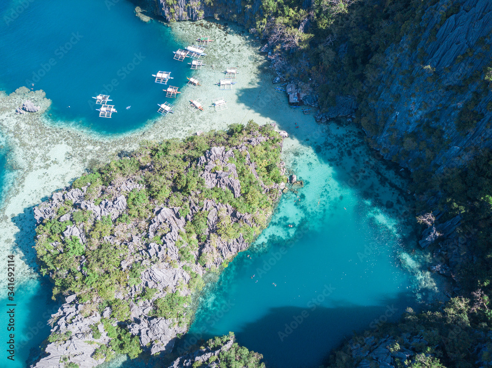 Aerial of magnificent Coron island lagoon, turquoise clear water and breathtaking views.