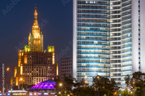 Architecture of Russian capital. Night cityscape with Radisson hotel and modern residential house. Moscow, Russia.