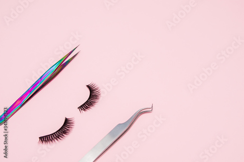 Fotografija Set for eyelash extension on a pink background