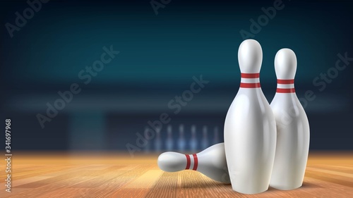 Photo Skittles close-up in a bowling alley on a wooden floor with blurry background