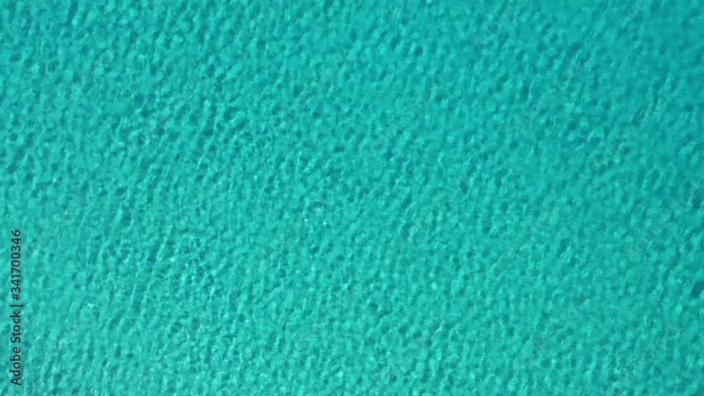 Overhead aerial still shot of gorgeous turquoise blue-green water moving, background Overhead aerial still shot of gorgeous turquoise blue-green water moving, background