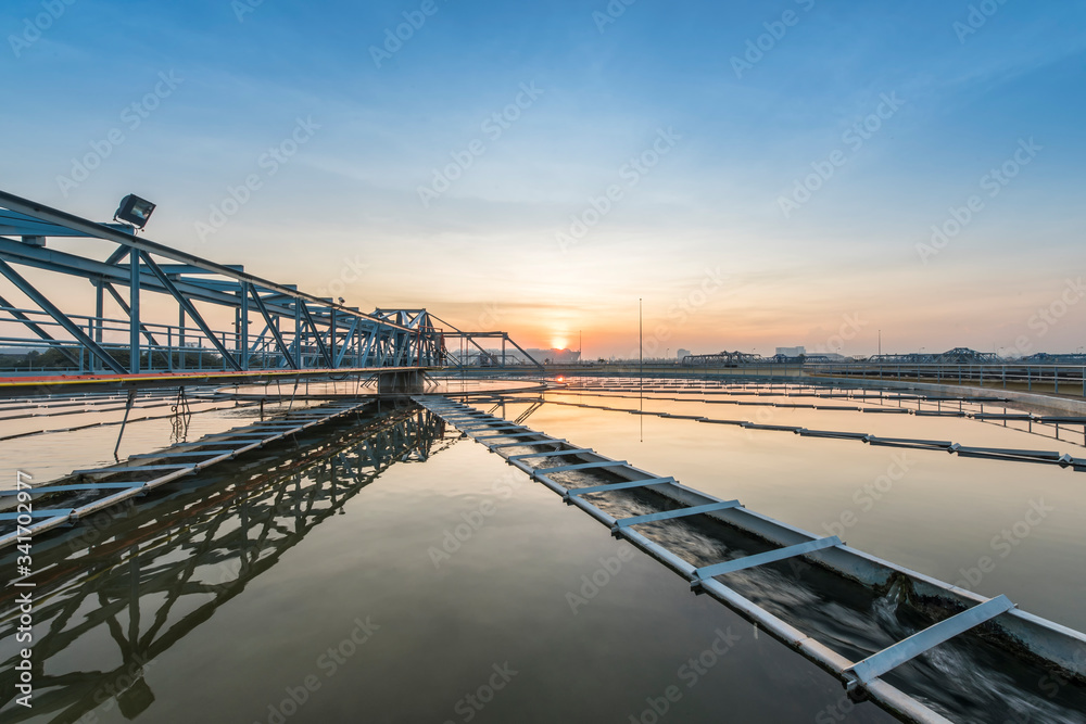 sedimentation basin, sewage flowing through large tanks in Water treatment plant sedimentation basin, sewage flowing through large tanks in Water treatment plant