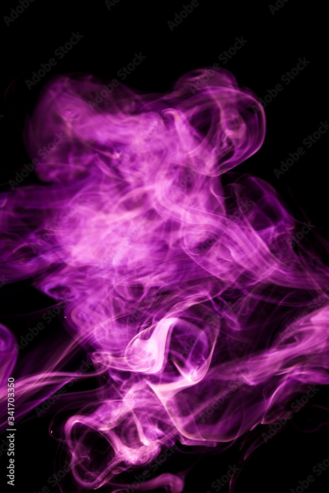 Purple smoke on black background